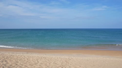 POV of landscape view of sea-beach in summer daytime with some wave in the sea ocean. Landscape of s