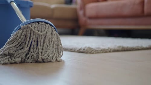 Cleaning Tiles Floor with Mop