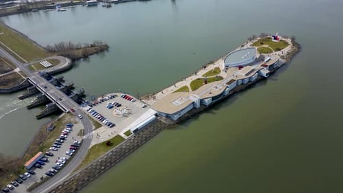 Scenic view of Danubiana art museum, parking lot, modern art museum on the shore
