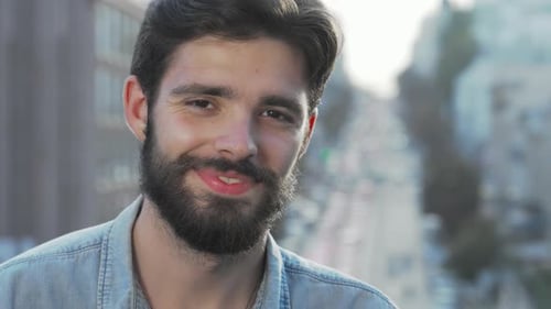 Cheerful Handsome Bearded Man Smiling Warmly at the Camera