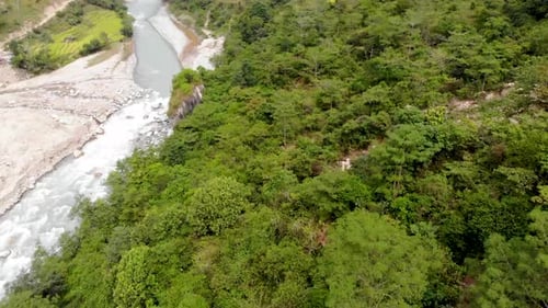 Green Vegetation At The Riverside Of Marshyangdi River On Annapurna Trek In Nepal. aerial