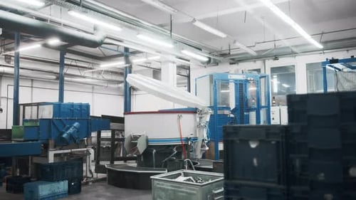 A big round chamber closing that is meant for cleaning and sanding metal parts after they come from
