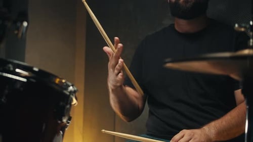 Expressive Drummer Young Man Professionally Playing on Dums in Studio Room Closeup Rock Metall Music