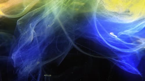 Abstract Swirling Blue and Yellow Against Black