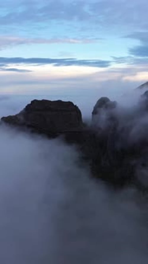 Pico Do Arieiro Clouds and Peaks Aerial Drone Shot Madeira Portugal Vertical Video