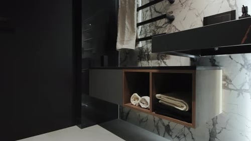 Modern Bathroom Design with Marble and Black Fixtures