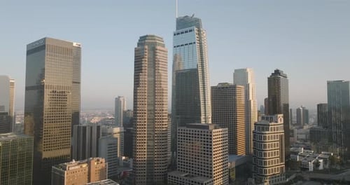 a city skyline with tall buildings