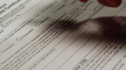 Hand Completing Form, Marking Partnership Box