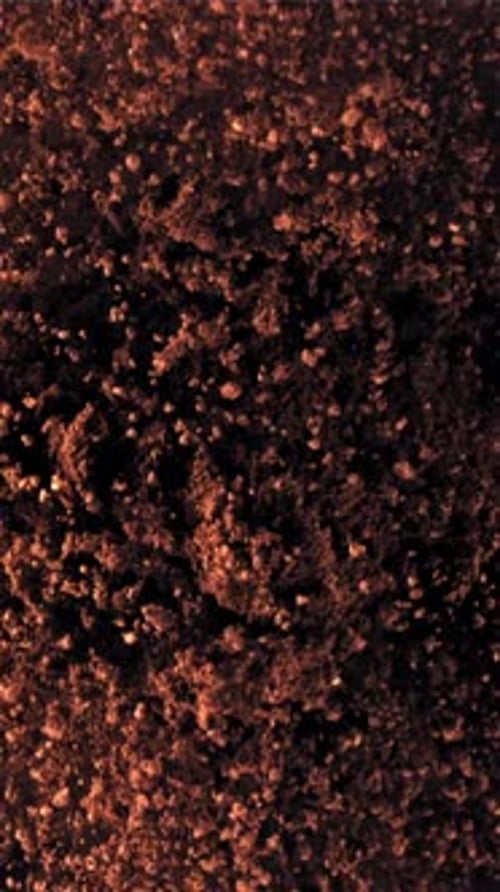 Ground Coffee Flies Up and Falls Down Filmed on a Highspeed Camera at 1000 Fps