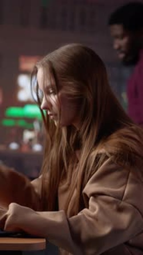 Vertical Video College Student Captivated By Literature Assignment at the Academic Library