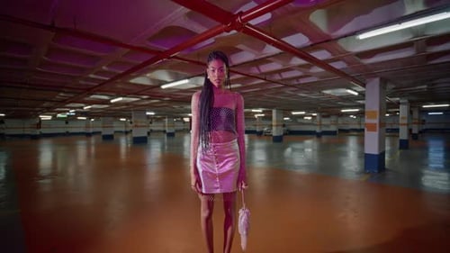 Stylish Woman Posing in Underground Parking Garage