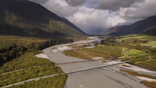 Wide aerial shot of bridges in Arthur's Pass, New Zealand