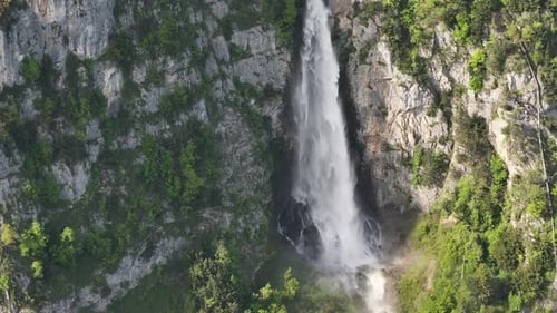 Wide aerial perspective of Seerenbachfälle waterfalls, highlighting their majestic descent.