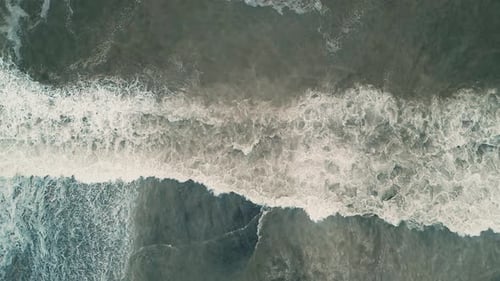 Thunder storm waves crashing on the beach