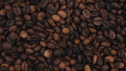 Roasted Coffee Beans Texture Background Camera Moving Top View Close Up