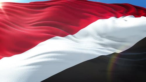 Yemen National Flag Waving in Wind with Realistic Fabric Texture