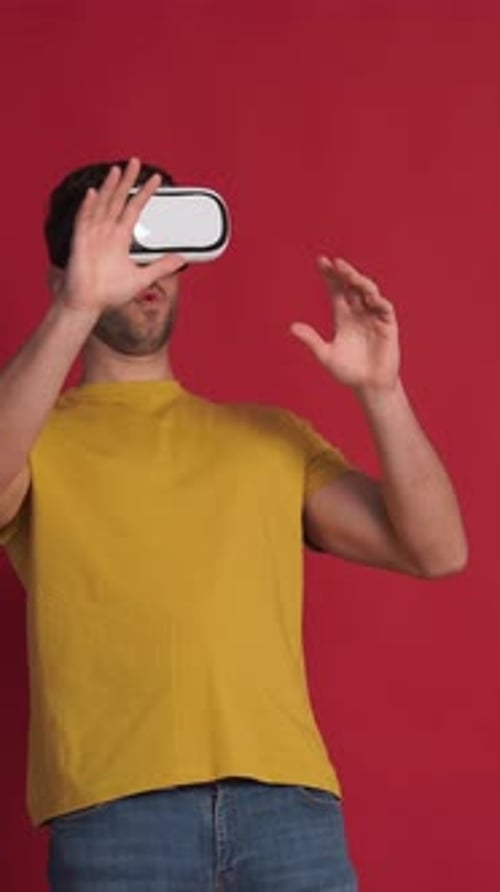 Man Experiences Virtual Reality with VR Headset