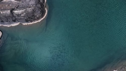 This Aerial View Captures a Tranquil Water Surface Perfect for Relaxation and Meditation
