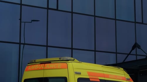 Ambulance Parked Outside Modern Hospital Building
