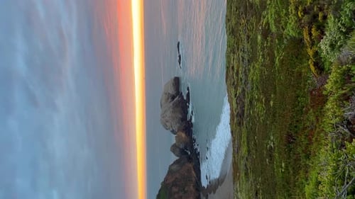 Incredible view of the sunset with orange colors on the coast.