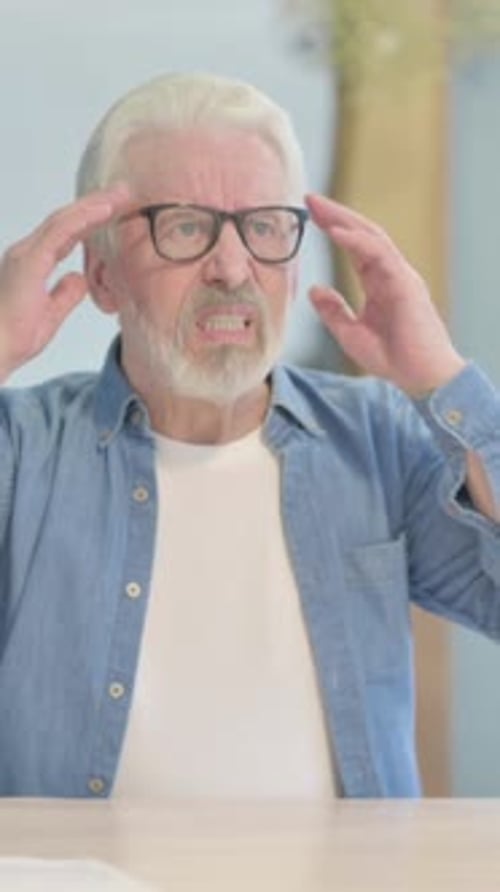 Tense Old Man with Headache in Office, Migraine, vertical video