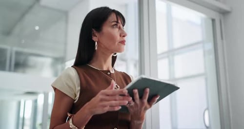 Thinking, office and business woman on tablet for story ideas, article review and online feedback