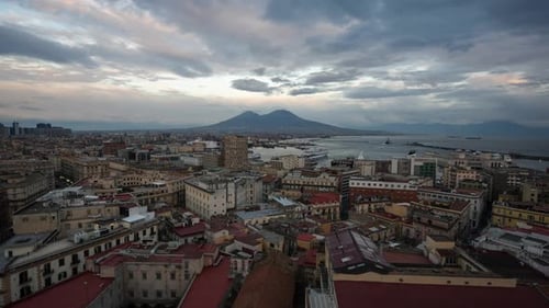 A day-to-night timelapse of Naples, Italy, capturing the enchanting Vesuvio volcano as the city's sk