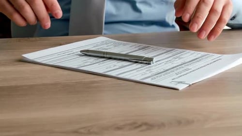 Businessperson Filling Tax Form