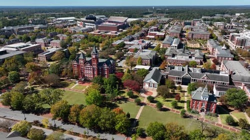 Aerial footage of college campus in the American South. University with brick buildings theme.