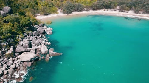 Cinematic Reveal of a beach, in magnetic island.