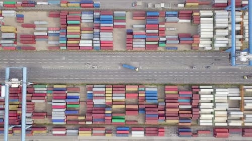 Port dock with Shipping Containers and transtainer cranes