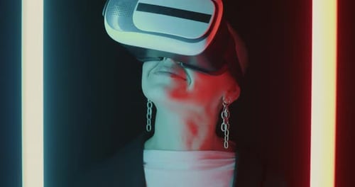 Stylish Woman Wearing a VR Headset in Futuristic Setting