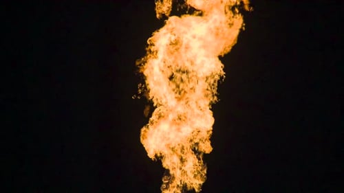 Vertical Column of Golden Fire Against Dark Background