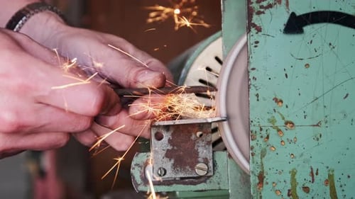 Metal Grinding on an Electric Grinding Wheel
