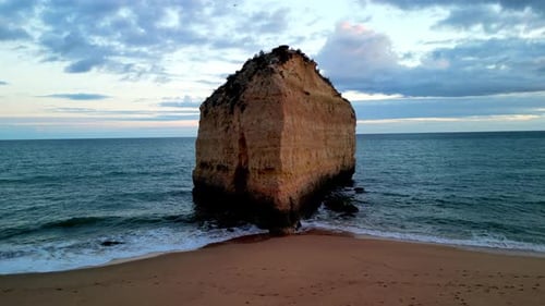 Aerial view of Praia da Cova Redonda beach and cliffs, Portugal.