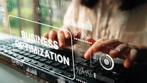 Business Optimization Concept with Data Analysis and Technology Interface on a Laptop Keyboard. Asym