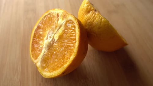 Fresh sliced orange fruit texture on rotating background