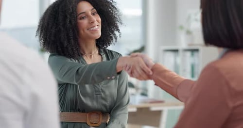 Business meeting, handshake and people applause in office with thank you, welcome or hiring