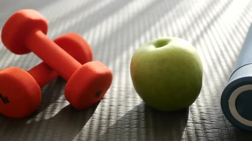Fitness Still Life with Dumbbells, Apple, and Water