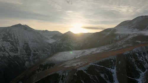 Aerial view of Majestic landscape of the Caucasus mountains at sunset.