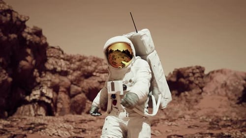 Astronaut Walking On Mars Surface Through Rocky Terrain And Martian Sand 5