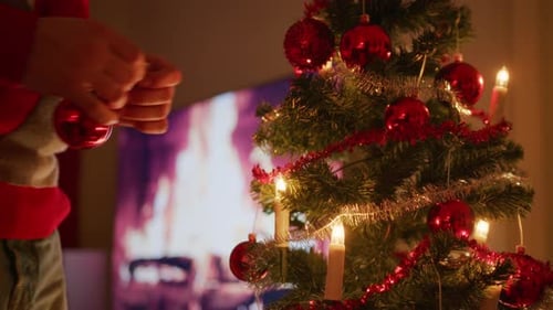 Decorating Christmas Tree with Warm Festive Atmosphere