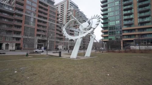 Sculpture in a public park in downtown Toronto in winter.