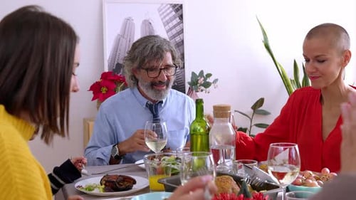 Family Gathering for Meal and Wine at Home