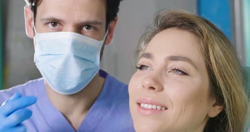 Woman Receiving Dental Check Up Close Up