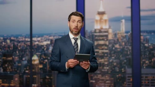 Professional Reporter Hosting Breaking News at Modern Television Studio Closeup