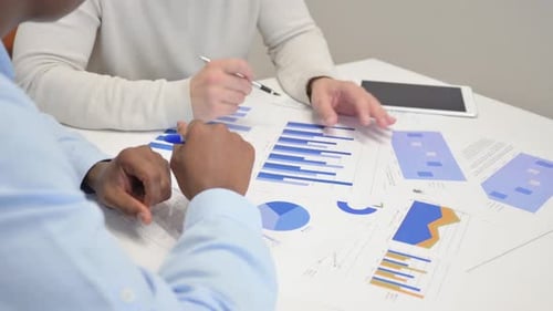 Business People Doing Paperwork in Office