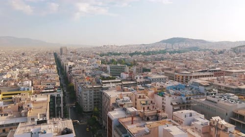 Panoramic Aerial View of Athens Cityscape Under a Clear Sky