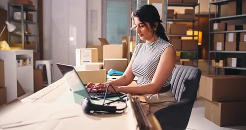 Small business, woman or laptop in warehouse for ecommerce, review website or answer order query