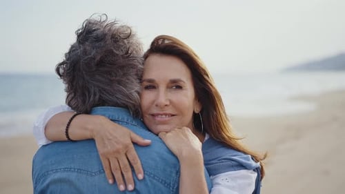 senior couple spending time on the beach